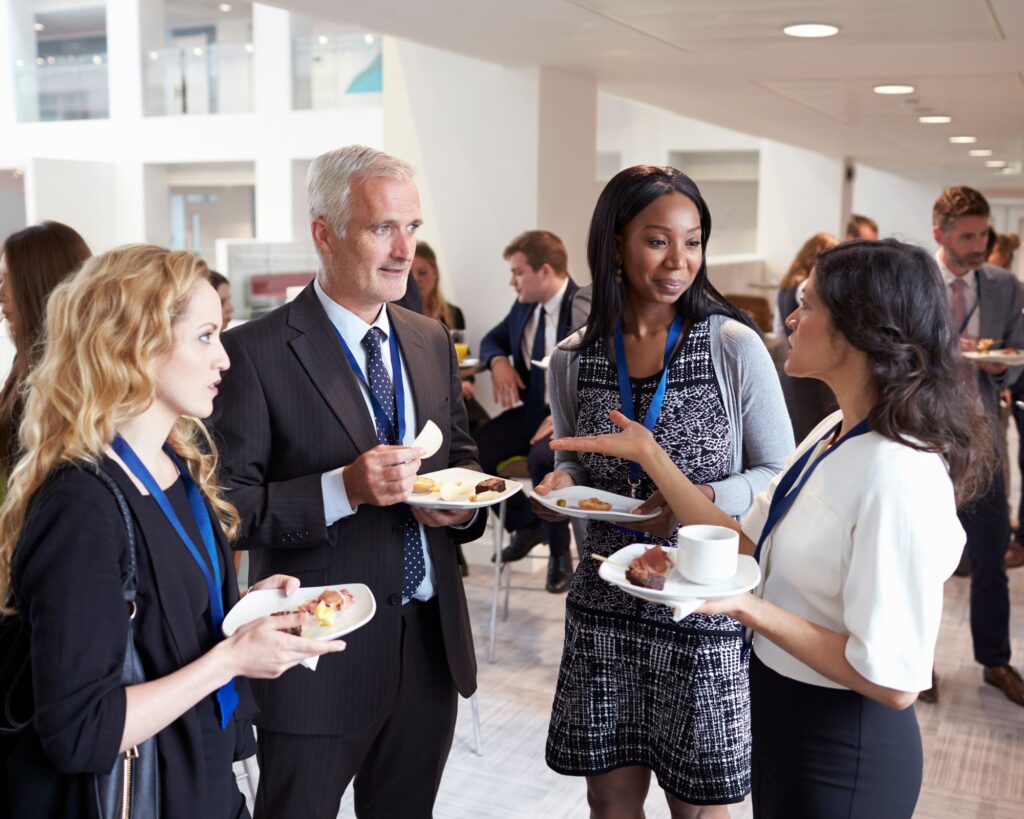 People talking and networking at a business function